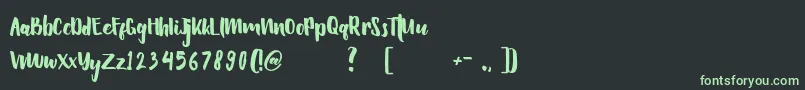 Hellowen Font – Green Fonts on Black Background