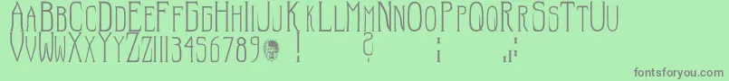 Hellraiser SC Font – Gray Fonts on Green Background