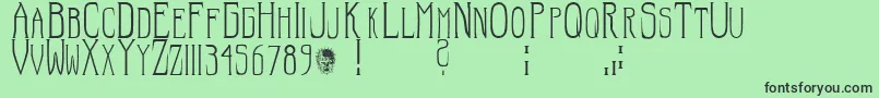 Hellraiser SC Font – Black Fonts on Green Background