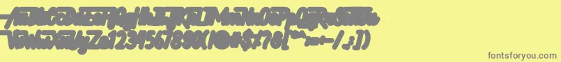 フォントHellytail Shadow – 黄色の背景に灰色の文字