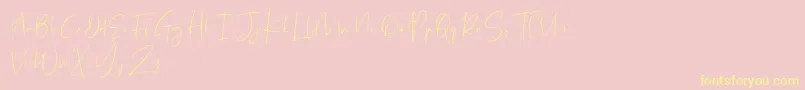 Helodia Demo-Schriftart – Gelbe Schriften auf rosa Hintergrund