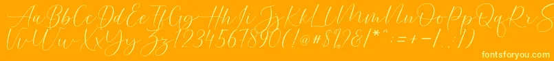 Helostar Font – Yellow Fonts on Orange Background