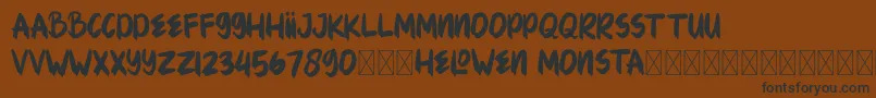 HELOWENMONSTA Font – Black Fonts on Brown Background