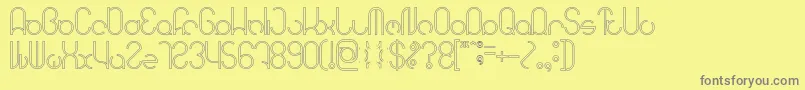 フォントHENDERSON Hollow – 黄色の背景に灰色の文字