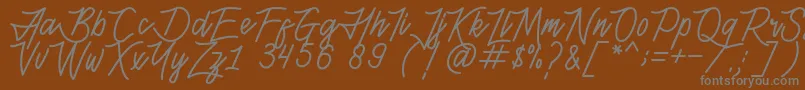 Шрифт HenshinScriptPersonalUse – серые шрифты на коричневом фоне