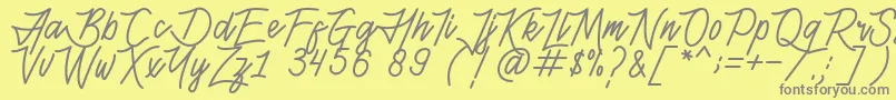 フォントHenshinScriptPersonalUse – 黄色の背景に灰色の文字