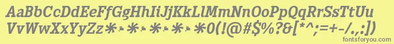 フォントHeptal Bold Italic – 黄色の背景に灰色の文字