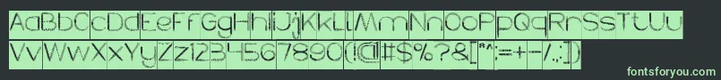 フォントHERBALISM Inverse – 黒い背景に緑の文字