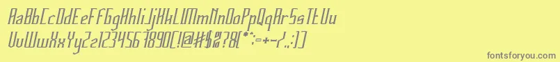 HERITAGE Bold Italic-fontti – harmaat kirjasimet keltaisella taustalla