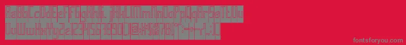 フォントHERITAGE Hollow Inverse – 赤い背景に灰色の文字