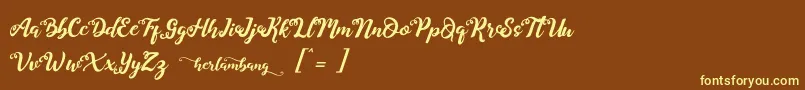 Herlambang Font – Yellow Fonts on Brown Background