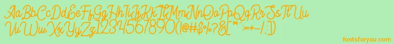 Hesland Demo Font – Orange Fonts on Green Background
