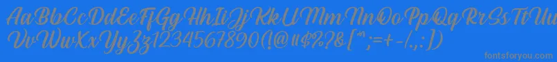 Hestina Font by Keithzo 7NTypes-fontti – harmaat kirjasimet sinisellä taustalla