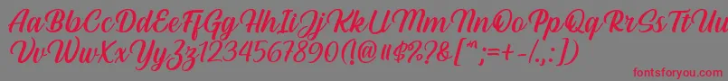 Шрифт Hestina Font by Keithzo 7NTypes – красные шрифты на сером фоне