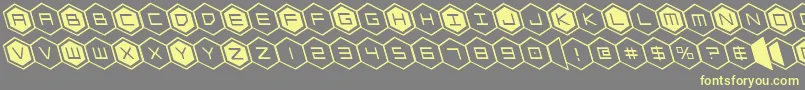 hexgonleft Font – Yellow Fonts on Gray Background