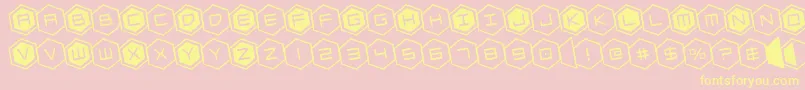 hexgonrotate-Schriftart – Gelbe Schriften auf rosa Hintergrund