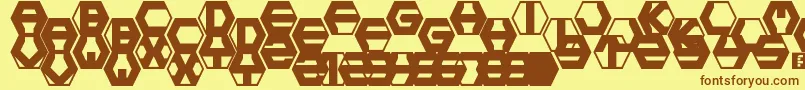 フォントhexotic ldr – 茶色の文字が黄色の背景にあります。
