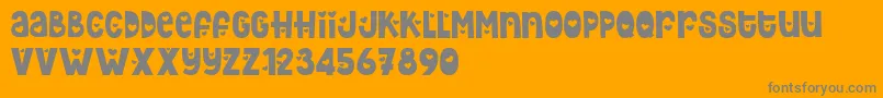 Hey Elsie Cute-fontti – harmaat kirjasimet oranssilla taustalla