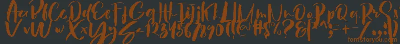 Czcionka Hey Sunset Brush Font – brązowe czcionki na czarnym tle