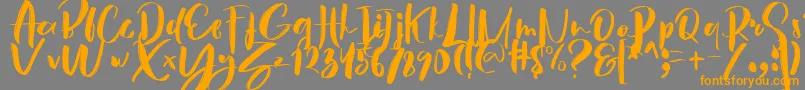Hey Sunset Brush Font-fontti – oranssit fontit harmaalla taustalla