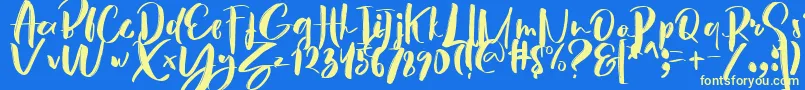 Hey Sunset Brush Font-fontti – keltaiset fontit sinisellä taustalla