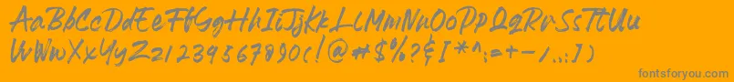 Fonte HeydharDemo – fontes cinzas em um fundo laranja