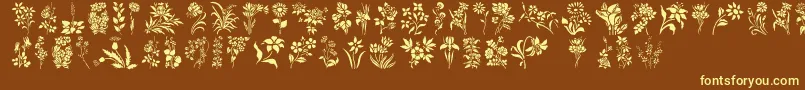 Fonte HFF Floral Stencil – fontes amarelas em um fundo marrom