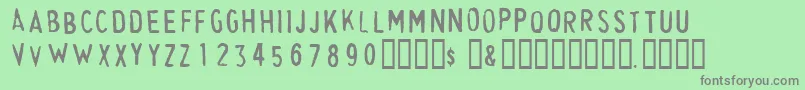 CheapskateFill Font – Gray Fonts on Green Background