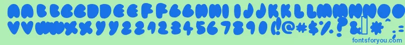フォントFatassfi – 青い文字は緑の背景です。
