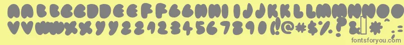 Weitere Informationen zur Fatassfi-Schriftart Fatassfi-Schriftart – Graue Schriften auf gelbem Hintergrund