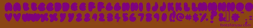 Fatassfi Font – Purple Fonts on Brown Background