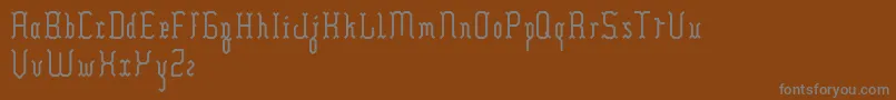 フォントHilia – 茶色の背景に灰色の文字