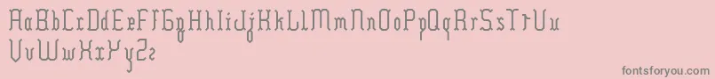 フォントHilia – ピンクの背景に灰色の文字