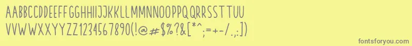 フォントHinami – 黄色の背景に灰色の文字