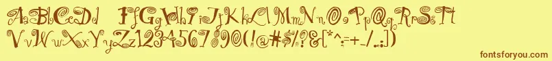 HipnOtik Font – Brown Fonts on Yellow Background