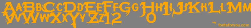 フォントHipotesiS – オレンジの文字は灰色の背景にあります。