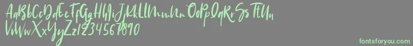 Hippie Unicorn-Schriftart – Grüne Schriften auf grauem Hintergrund