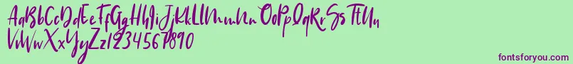 Hippie Unicorn-Schriftart – Violette Schriften auf grünem Hintergrund