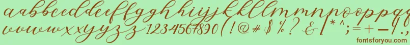 Fonte Hiters Script – fontes marrons em um fundo verde