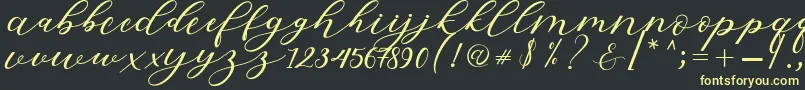 Hiters Script Font – Yellow Fonts on Black Background