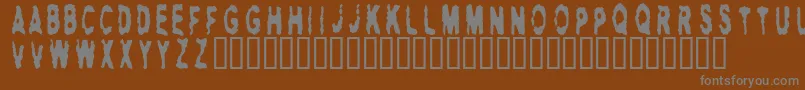 HITMAN   Font – Gray Fonts on Brown Background