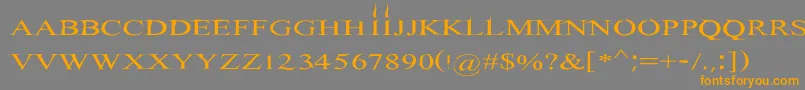 フォントHitman – オレンジの文字は灰色の背景にあります。