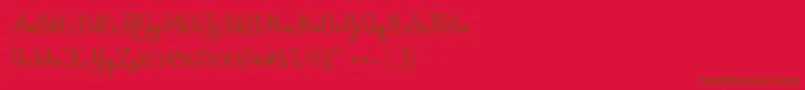 フォントHiyida Script Demo – 赤い背景に茶色の文字