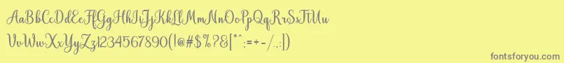 フォントHiyida Script Demo – 黄色の背景に灰色の文字
