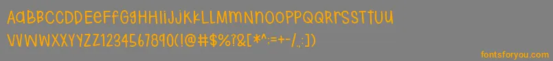 フォントHodgepodgery DEMO – オレンジの文字は灰色の背景にあります。