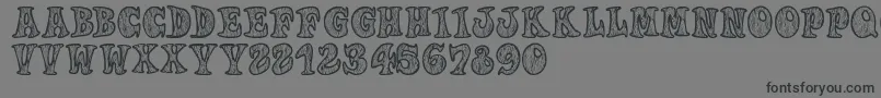 フォントWoodys – 黒い文字の灰色の背景