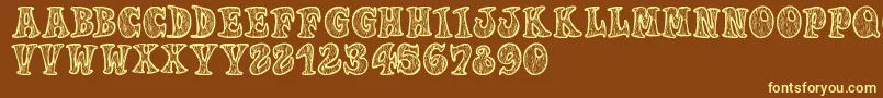 Woodys-fontti – keltaiset fontit ruskealla taustalla