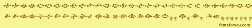 フォントHokjesgeestCubeTopCW – 茶色の文字が黄色の背景にあります。