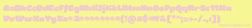 Holden Fat trial-fontti – vaaleanpunaiset fontit keltaisella taustalla