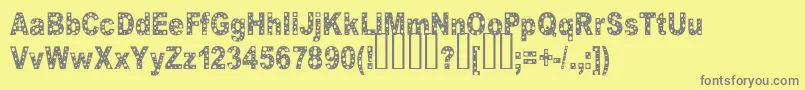 Hole-fontti – harmaat kirjasimet keltaisella taustalla